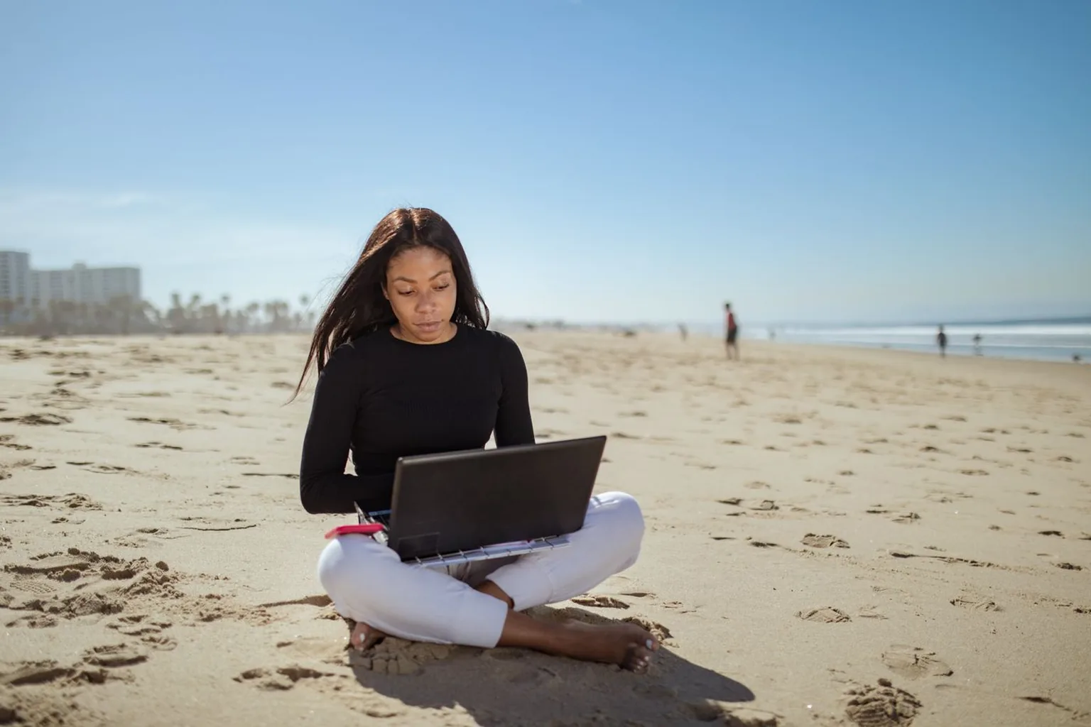 Professional woman working on a laptop